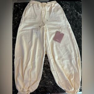 Harem styled jogging pants.